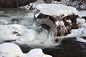 The icy headwaters of Alaska`s Little Susitna river photo