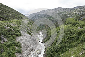 Alaska wooden train trestle over river