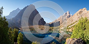 Alaudin lakes in Fann mountains, Tajikistan. Picturesque panorama of turquoise lake in Fann mountains. Beautiful nature landscape