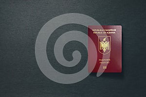 Albania Passport on dark background with copy space - 3D Illustration