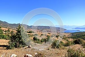 Albania- Prespa National Park- Lake Prespa with Maligrad Island - Greece and Macedonia in the background