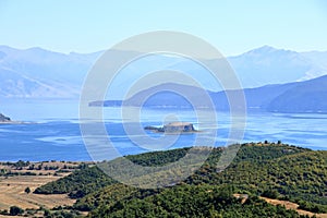 Albania- Prespa National Park- Lake Prespa with Maligrad Island - Greece and Macedonia in the background