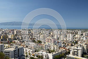 Albania, Vlore, cityscape seen from Kuzum Baba hill. Aerial city view, city panorama of Vlore with the monument of the