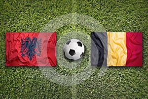 Albania vs. Belgium flags on soccer field