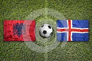 Albania vs. Iceland flags on soccer field