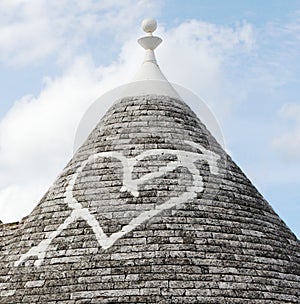 Alberobello, Puglia Region, South of Italy. Trulli di Alberobello. Traditional roofs of the Trulli, original and old houses of th