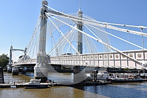 Albert Bridge is a road bridge over the Tideway of the River Thames connecting Chelsea in Central London