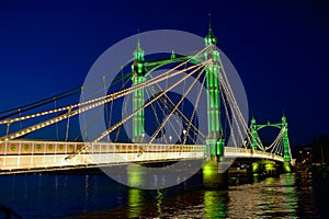 Albert Bridge, Thames, London England UK at night photo