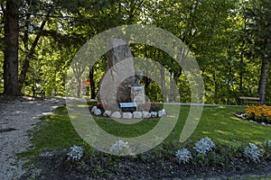 The Albert I, King of the Belgians monument in small garden at Cortina d`Ampezzo, Dolomites, Alps, Veneto