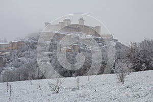 Albornoz Rocca of Spoleto under the snow photo