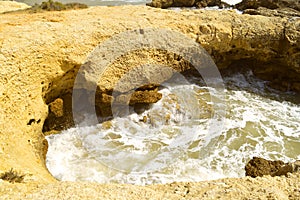 Albufeira Auramar beach rock erosion