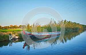 Albufera canal boats in El Palmar de Valencia Spain