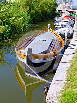 Albufera channel boats in el Palmar of Valencia