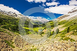 Albula pass road in Swiss Alps near Sankt Moritz photo