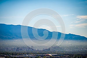 Albuquerque new mexico skyline in smog with mountains