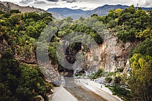 Alcantara Gorge and Alcantara river park in Sicily Island, Italy. Gole Alcantara Botanical and Geological Park