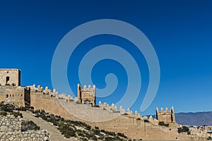 Alcazaba wall on a hill in an arid land in Almeria Spain