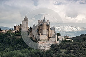 Alcazar castle in Segovia with PeÃ±alara mountain