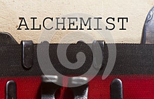 Alchemist typed on a vintage paper photo
