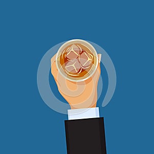 Alcohol addiction concept, hand holding glass with alcoholic drink