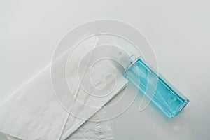 Alcohol bottle with tissue paper sheet for sanitary and health