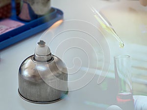 Alcohol burner and  test tube in rack,science laboratory research and development concept