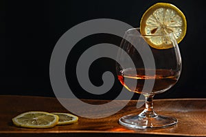 Alcohol drinks, cognac. Dark background