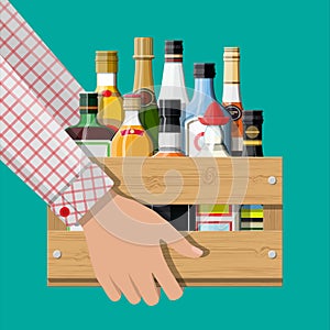 Alcohol drinks collection in box in hand