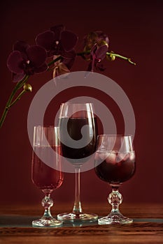 Alcohol drinks on dark solid background