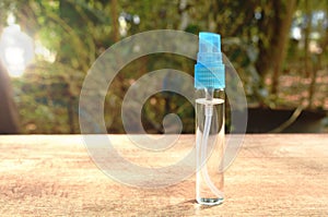 Alcohol or gel based hand sanitized spray to washing and cleaning disease on table