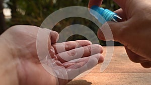 Alcohol or gel based hand sanitized spraying on hand to washing and cleaning disease