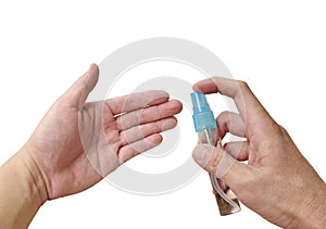 Alcohol or gel based hand sanitizer spraying on hand to washing and cleaning disease in white background