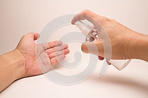 Alcohol gel inject spread on hand with white background