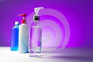 Alcohol gel In the pump bottle Used for sterilize In the purple background