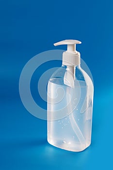 Alcohol Gel to prevention coronavirus. hand sanitizer soap. blue background