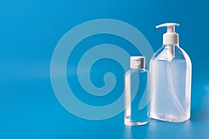 Alcohol Gel to prevention coronavirus. hand sanitizer soap. blue background