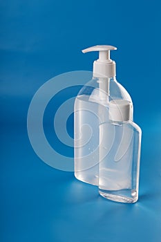 Alcohol Gel to prevention coronavirus. hand sanitizer soap. blue background