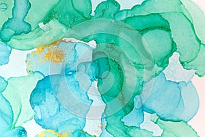 Alcohol ink blue abstract background. Ocean style watercolor texture. Blue and gold paint stains illustration