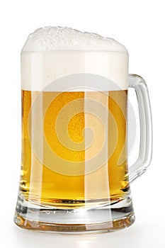 Alcohol light beer mug with froth photo