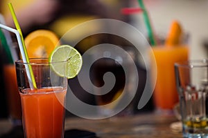 Alcohol orange daiquiri cocktail on beach bar