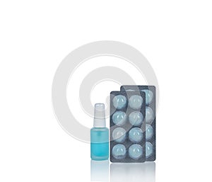 Alcohol spray in glass bottle container isolated on white background. Cotton ball with alcohol in blister pack for cleaning hand