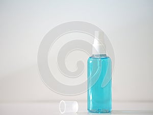 alcoholic 70 percent in clear Plastic bottle Spray, Hand Sanitizer on pink background washing clean dirty to prevent germs protect