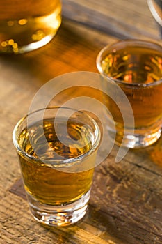 Alcoholic Brown Rum in a Shot Glass