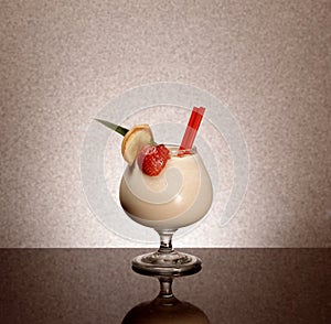 Alcoholic cocktail drink in a brandy style short stem bulbous glass