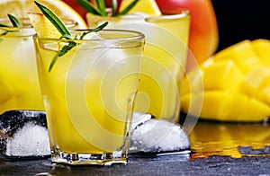 Alcoholic cocktail, mango rum collins, with syrup, lemon juice,