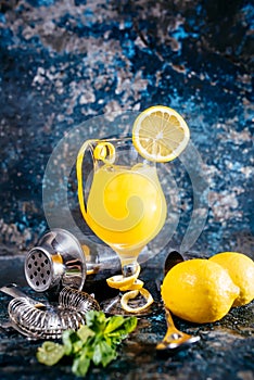 alcoholic cocktail, refreshment drink with vodka and lemons served at bar