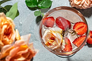 alcoholic cocktail with wine, strawberry in glasses, top view. place for text