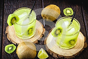 alcoholic drink based on kiwi and Aguardente  cocktail based on distilled drink and fruits  called caipirinha in Brazil and in