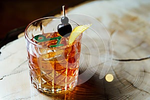 Alcoholic drink. A cocktail with elite alcohol on dark black background