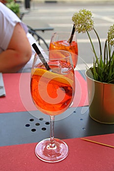 alcoholic drink, drink, aperol spritz in a glass, drinks with ice and orange, italian aperitiv, cold drink